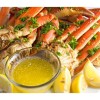 Hands on a Snow Crab Leg