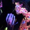 Paint in the Dark™  UV body painting class for couples