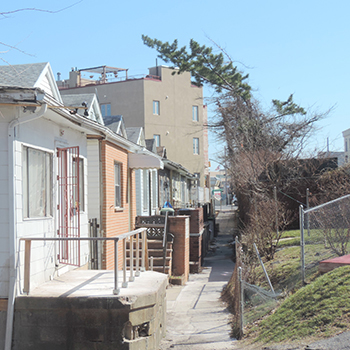 Looking southeast along Canda Avenue on a sunny afternoon